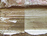 Close-up examination of marks and gouges on a metal surface.