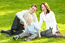 Image of a family on a lawn