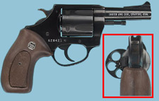 Revolver handugn, showing 2 views: profile, and from rear with cylinder out.