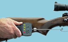 Trigger Pull Digital Scale held in place on a rifle trigger.