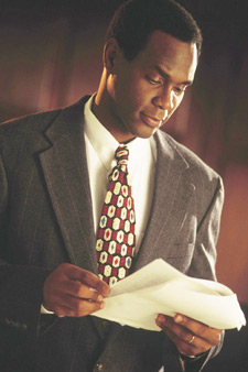 Man in suit with papers