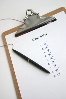 Image of clipboard with completed checklist.