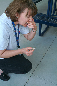 Image of a woman sneezing