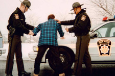 Image of man being arrested